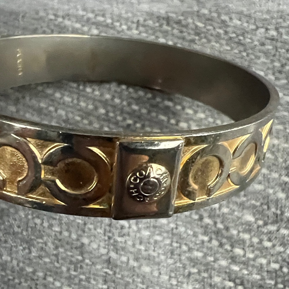 Coach Gold and Silver Circular Pattern Bangle
